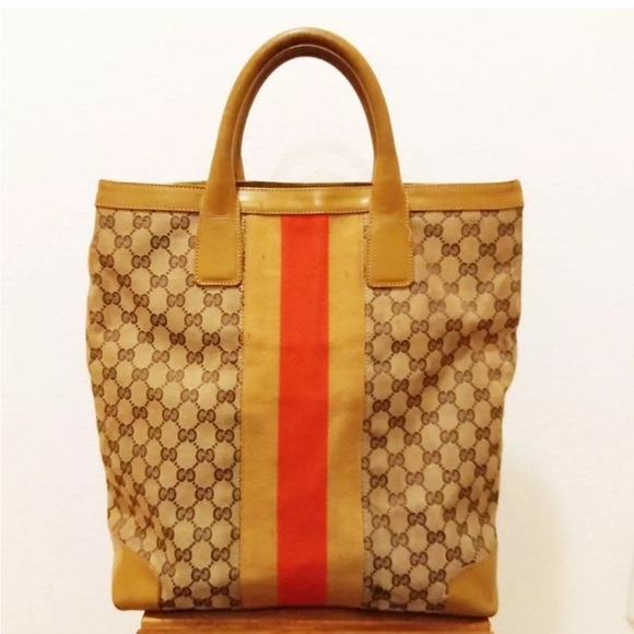 Gucci Handbags - Gucci Tote Authentic lg monogram- leather/canvas.. Final Price!